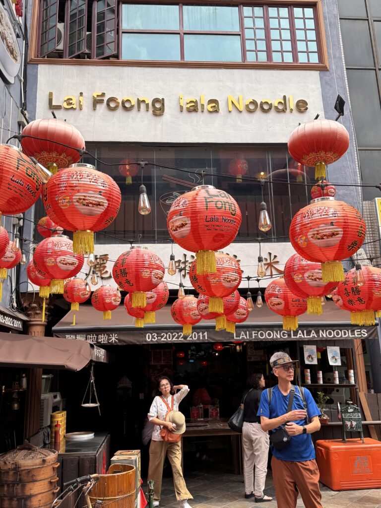 Exterior of Lai Foong Lala Noodles in Chinatown, Kuala Lumpur, with red Chinese lanterns hanging outside the entrance.