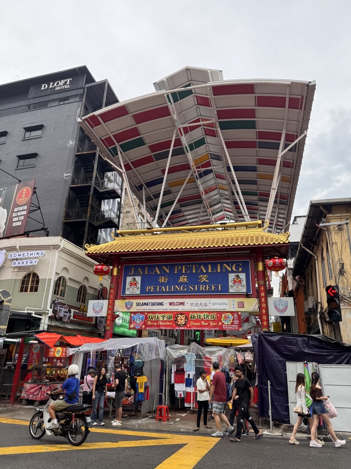 Vibrant street view of Petaling Street Market in Chinatown Kuala Lumpur near Seoul Vibe KL.