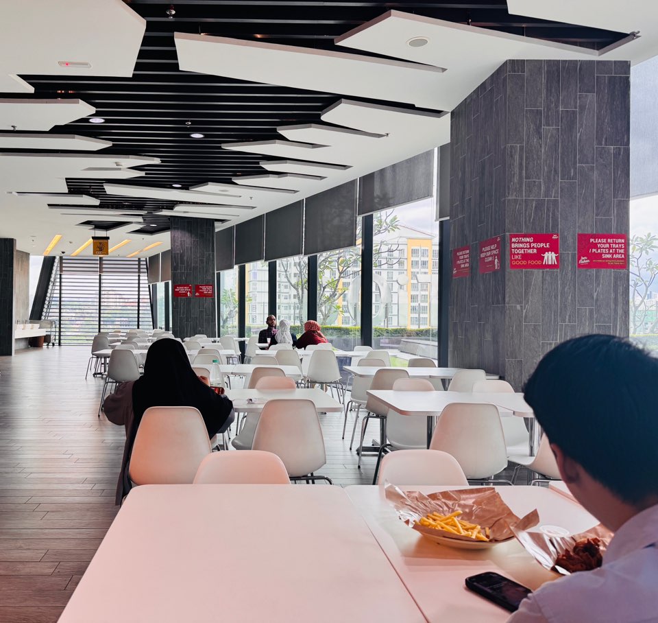 Seating area inside Etiqa Building food court in Bangsar