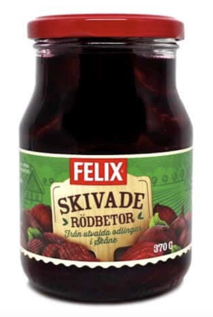 Jar of Swedish pickled beets commonly served with Pytt i Panna and other home-style meals