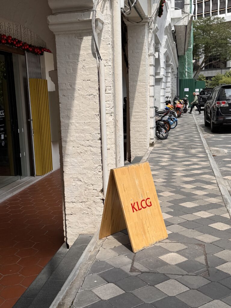 Sidewalk view outside KLCG Confectionery & Bakery in Kuala Lumpur’s historic district.