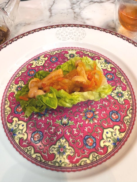 Savory cabbage wrap filled with soy-seasoned vegetables served as part of the afternoon tea set.