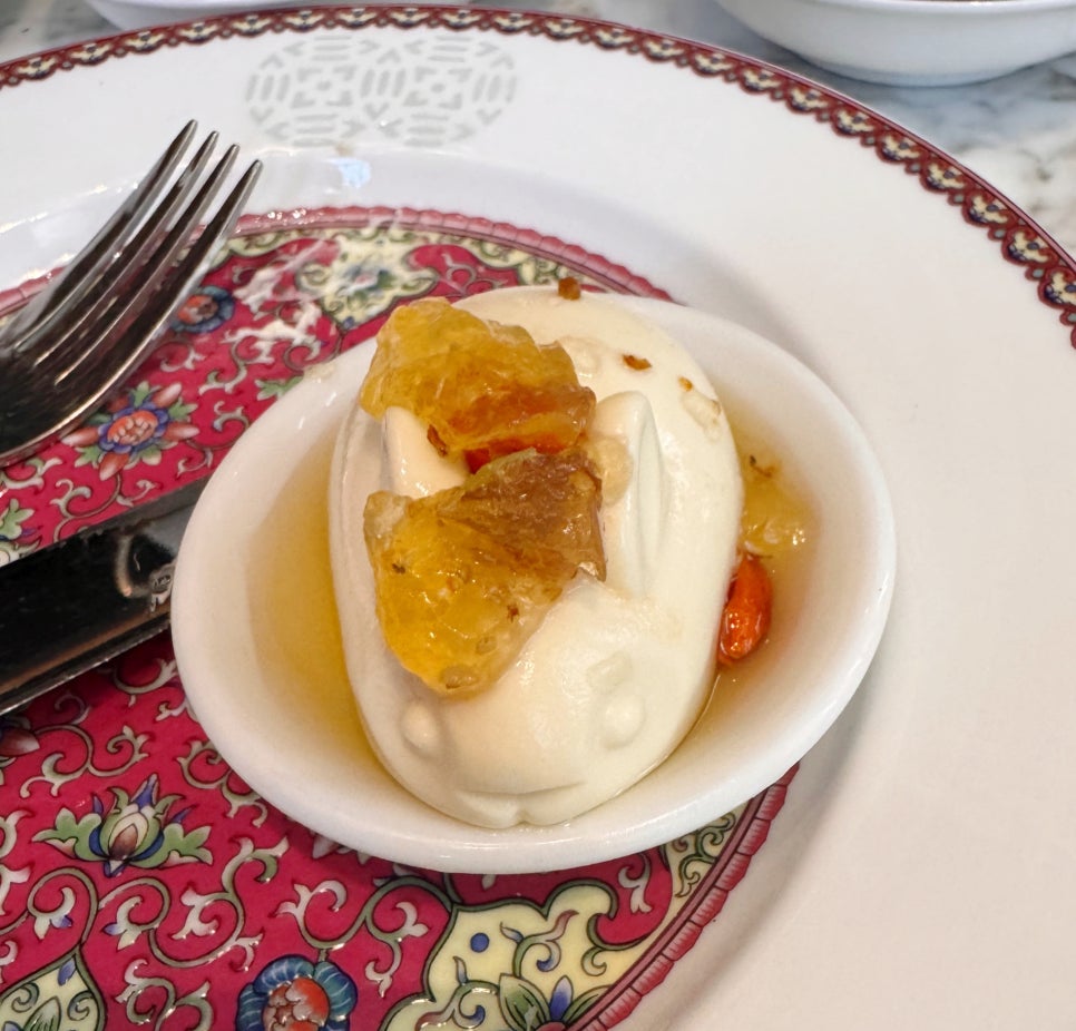 Rabbit-shaped panna cotta dessert served on a patterned plate at Lady Yi’s Tea House.