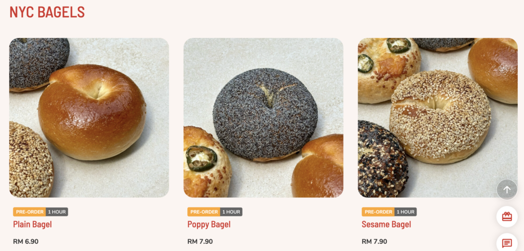 Classic New York–style bagels at KLCG Confectionery & Bakery, including plain, poppy seed, and sesame bagels.